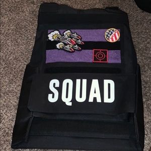 Tactical purple and black vest